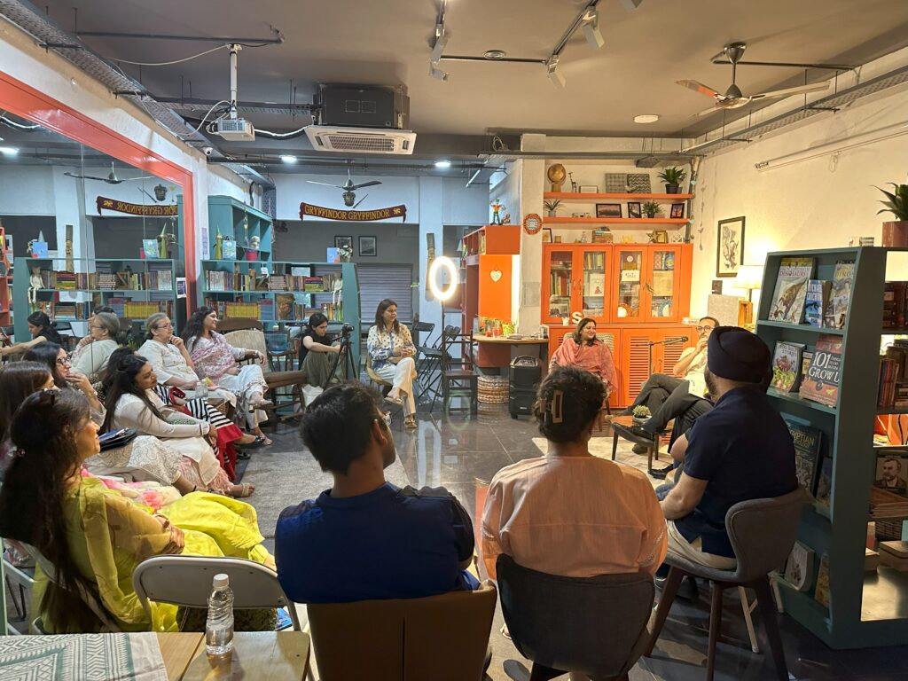 A wide shot of the audience listening to the storyteller during a Qissa Kahaani over Biryani event with the theme - Love Stories.