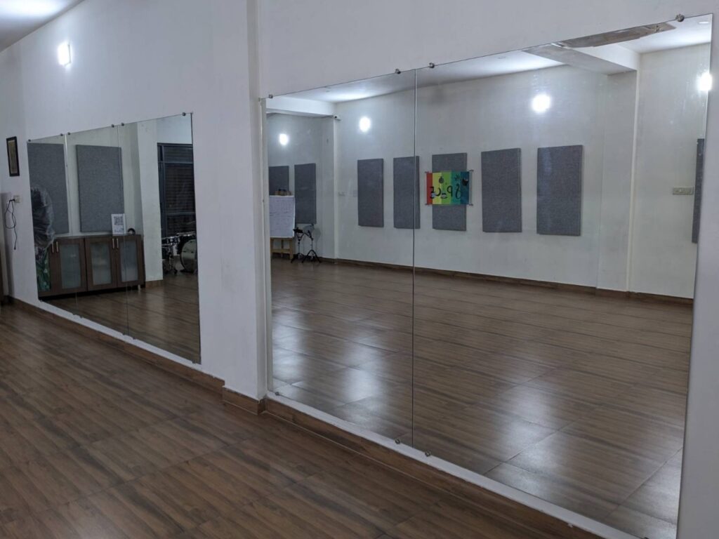 A photo of the 2nd floor of The Space highlighting the mirrored wall.